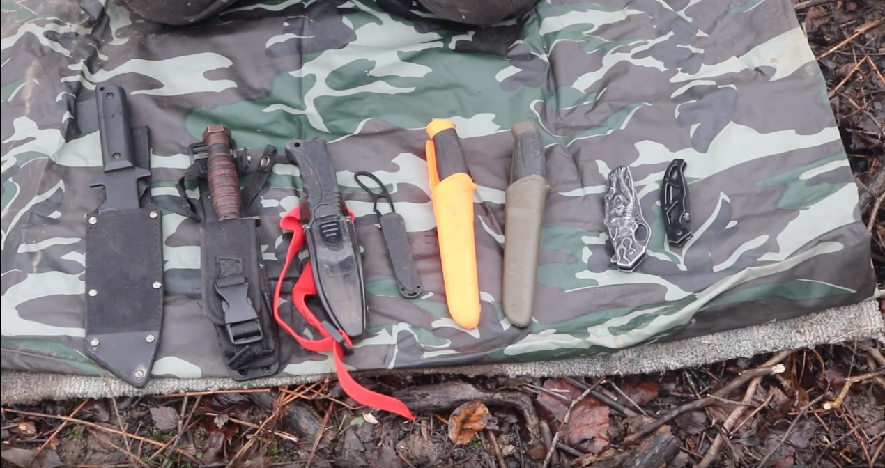 Pile of knives on a tarp